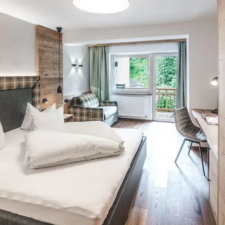 Alpenland - & Breakfast Отель 4*