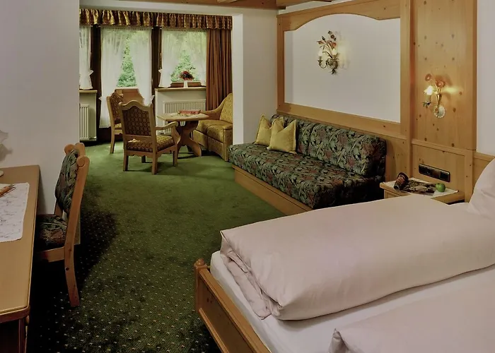 Otel Alpenland - & Breakfast 4*